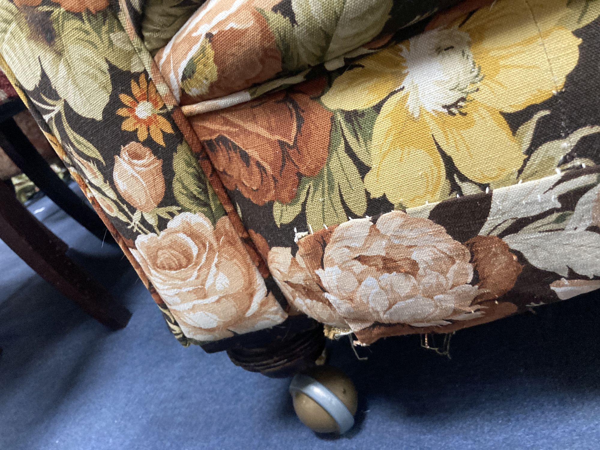 A Victorian floral upholstered Chesterfield settee, length 200cm, depth 85cm, height 68cm